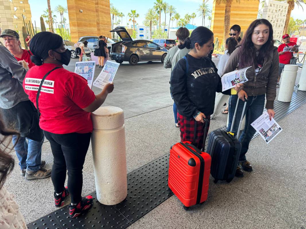 Culinary Local 226 members hand out union fliers during a 48 hour strike at Virgin Hotels in La ...