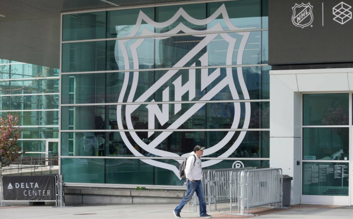 A sign celebrating the awarding of a new NHL team to Utah is shown at the Delta Center Friday, ...