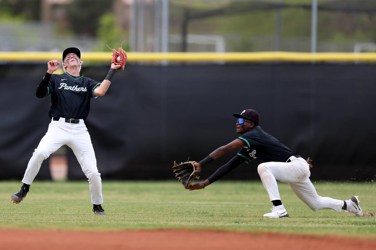 Palo Verde infielder Ethan Clauss, left, catches for an out on Coronado while outfielder R.L. C ...