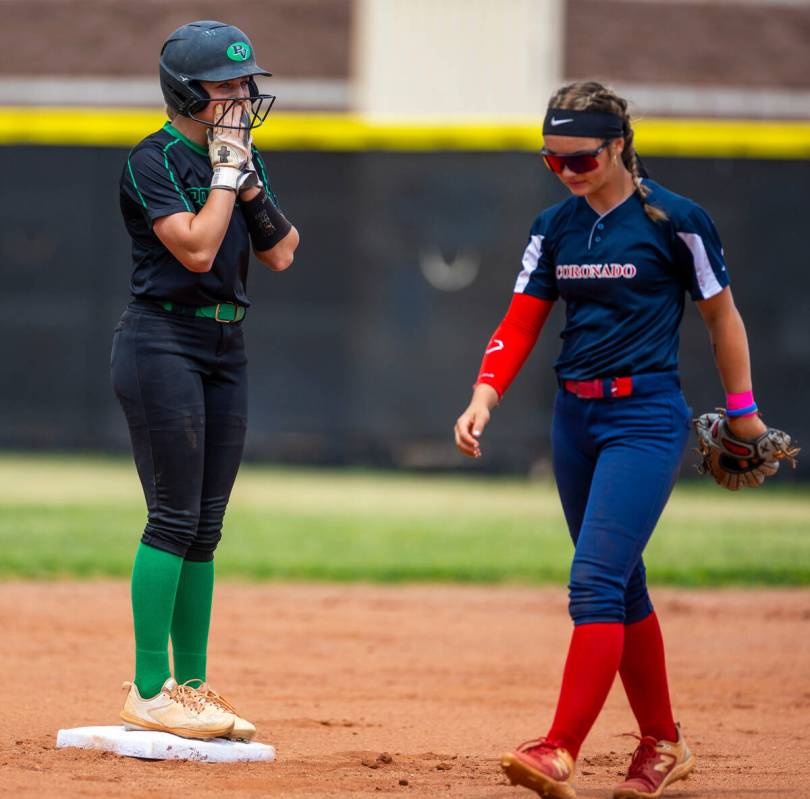 Palo Verde runner Taylor Johns is surprised to advance to second base as Coronado infielder Bai ...