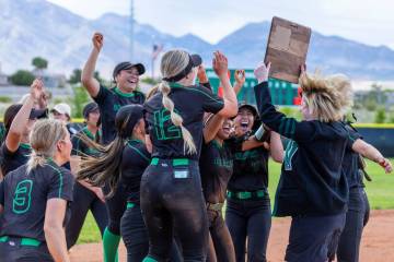 Palo Verde teammates celebrate receiving the winning plaque after defeating Coronado in their 5 ...