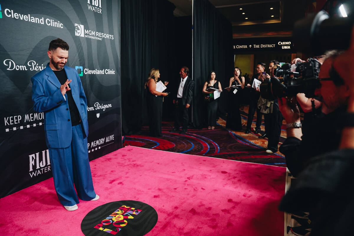 Singer Andy Grammer poses for photographs on the red carpet at the 27th annual Power of Love ga ...