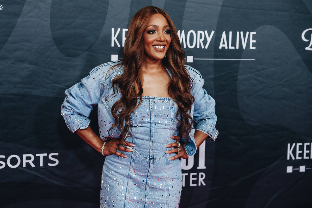Singer Mickey Guyton poses for photographs on the red carpet at the 27th annual Power of Love g ...