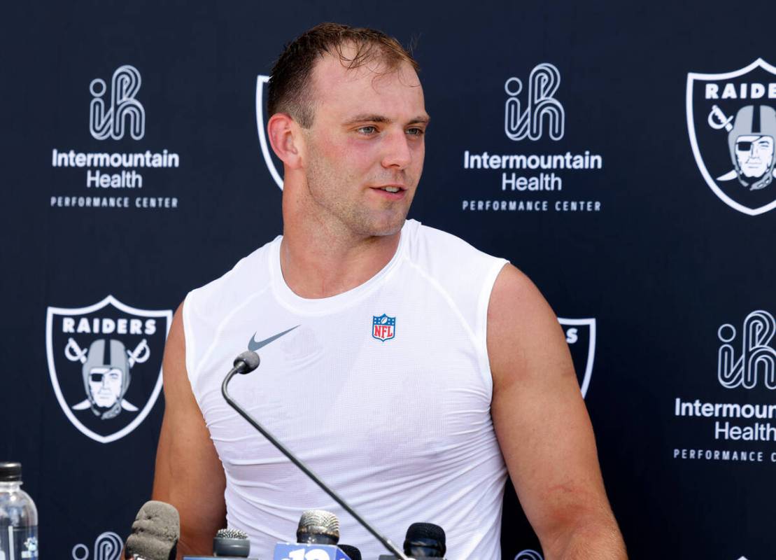 Raiders rookie tight end Brock Bowers listens to reporters questions as he addresses the media ...