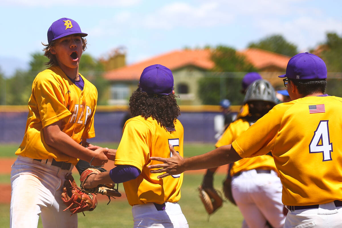 Durango infielder Aiden Farrell, left, celebrates with outfielder Gabe Capitini (5) after they ...