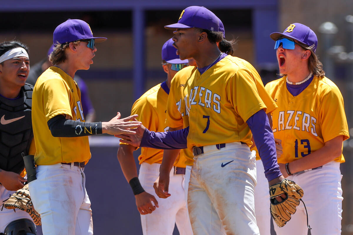 Durango celebrates after winning a Class 4A high school state playoff game against Sierra Vista ...