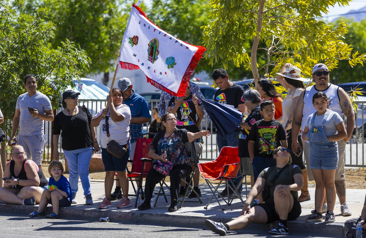 Families watch the festivities along the route during the Helldorado Parade moving up 4th Stree ...