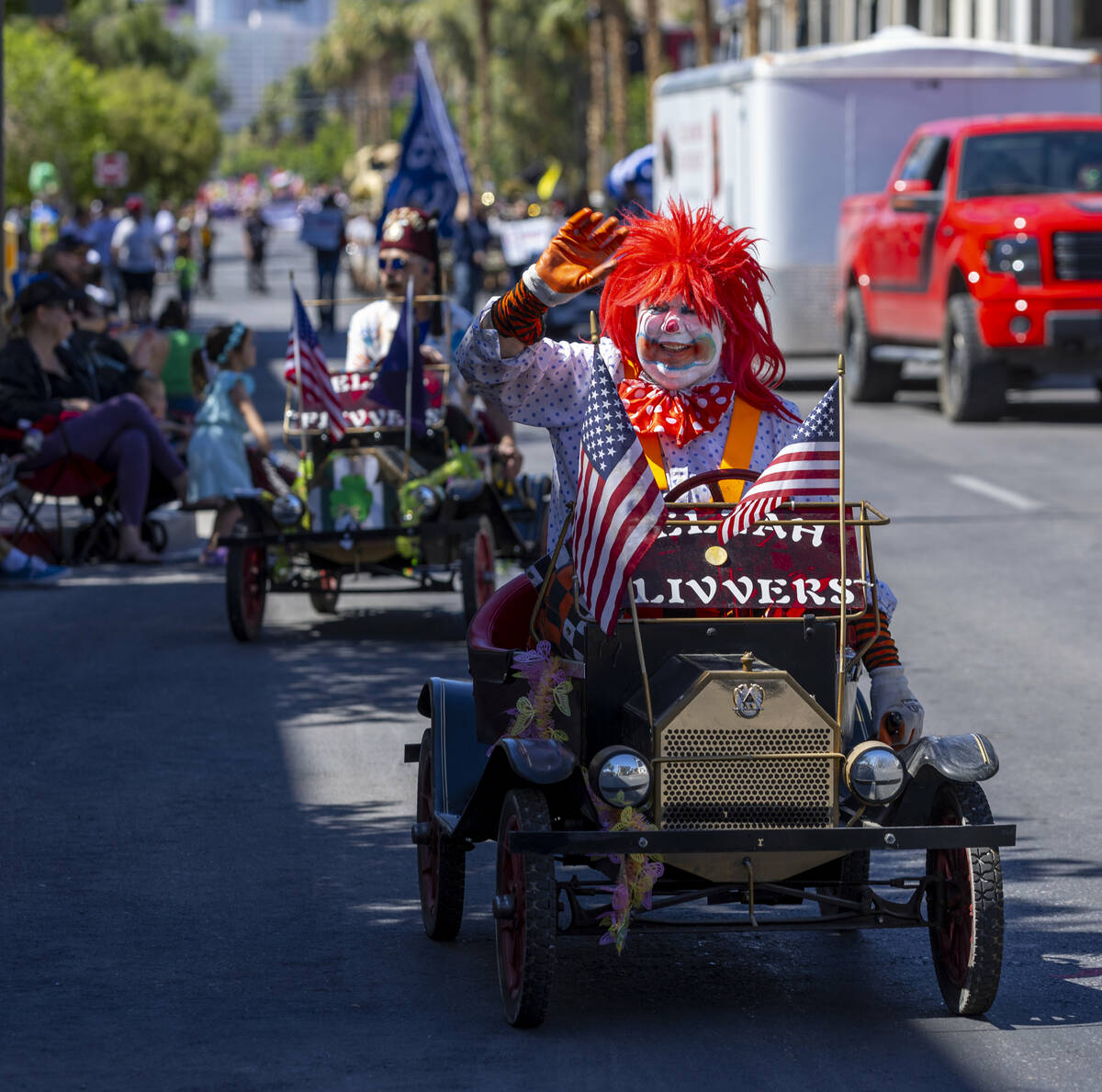 A Zelzah Shriner clown entertains the families seated along the route during the Helldorado Par ...