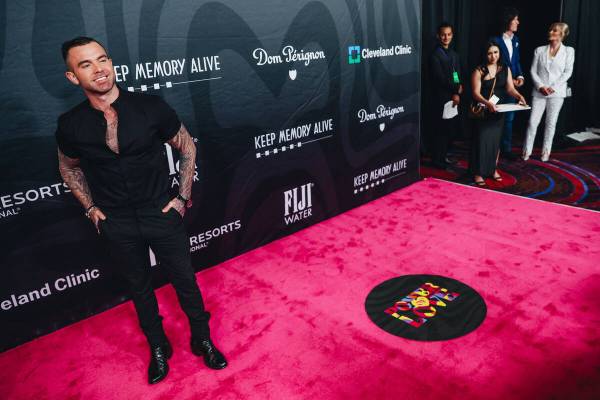 Singer Jay Allen poses for photographs on the red carpet at the 27th annual Power of Love gala ...
