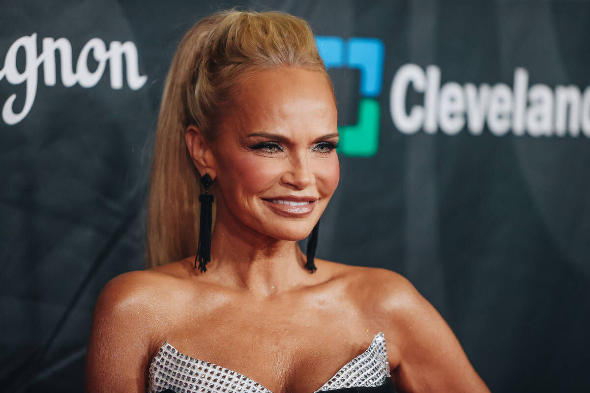 Actress and singer Kristin Chenoweth poses for photographs on the red carpet at the 27th annual ...