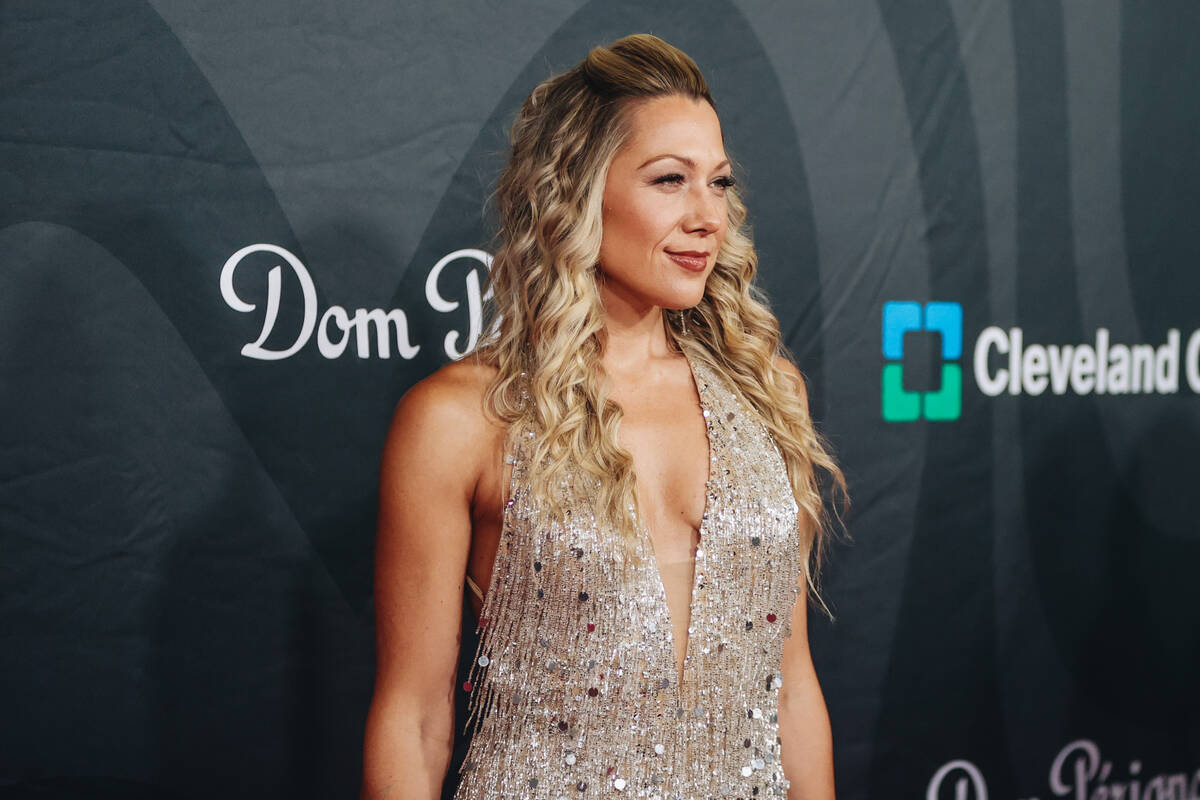 Singer Colbie Caillat poses for photographs on the red carpet at the 27th annual Power of Love ...