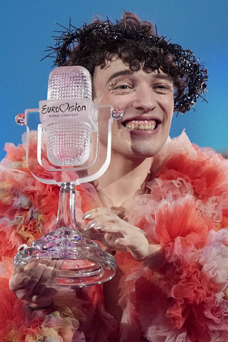 Nemo of Switzerland, who performed the song The Code, celebrates after winning the Grand Final ...