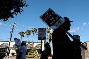 Hospitality workers demonstrate on the second day of a strike outside Virgin Hotels Las Vegas o ...