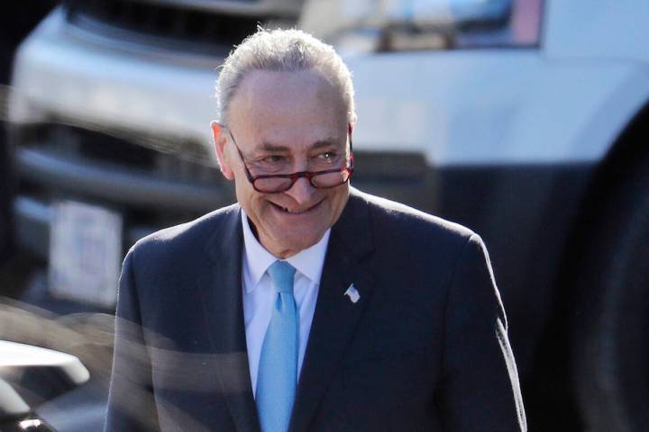 Senate Minority Leader Chuck Schumer of N.Y. walks to his vehicle following his meeting with Pr ...