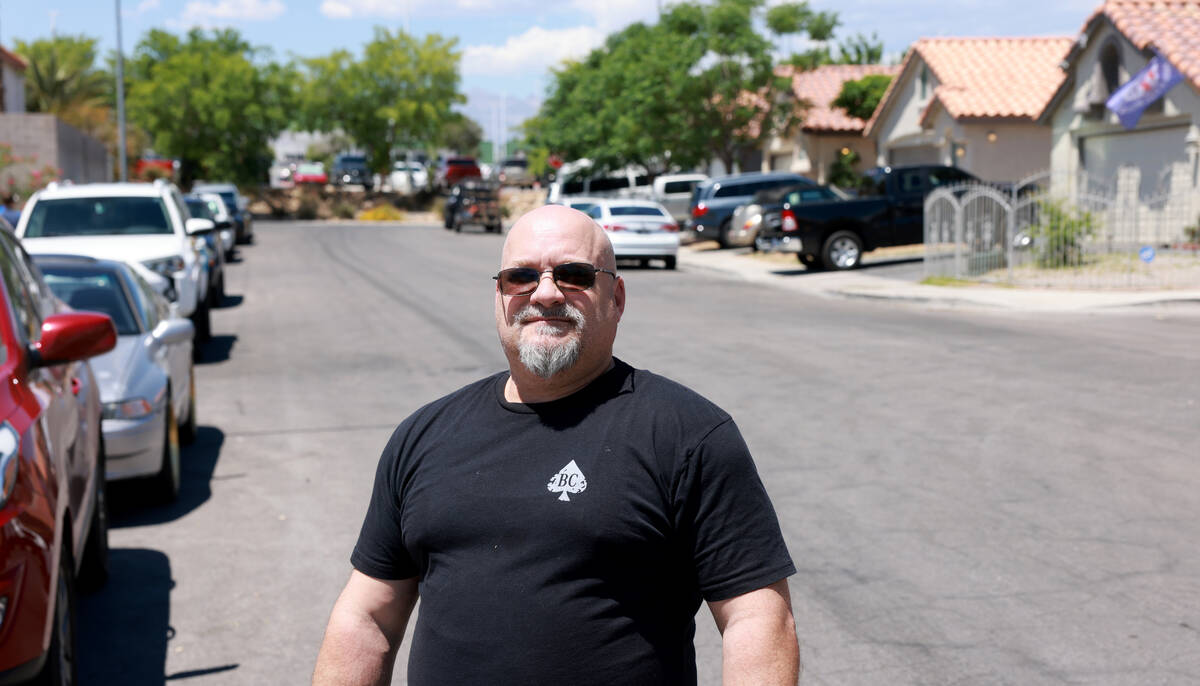 Thomas Maddox talks to a reporter on the 2300 block of Goldhill Way, near Vegas and Rancho driv ...