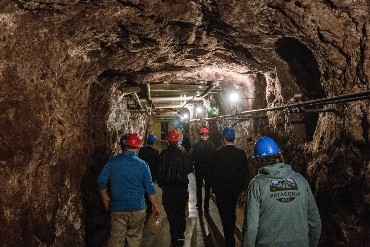A tour of Hoover Dam moves through interior tunnels on Dec. 13, 2019. (Ellen Schmidt/Las Vegas ...