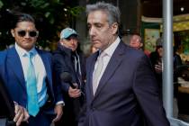 Michael Cohen leaves his apartment building on his way to Manhattan criminal court, Monday, May ...