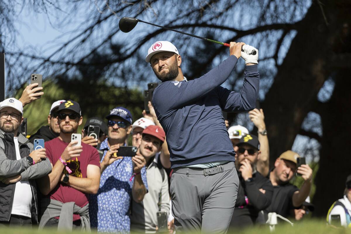 Captain Jon Rahm of Legion XIII hits his shot on the 18th hole during the second round of LIV G ...