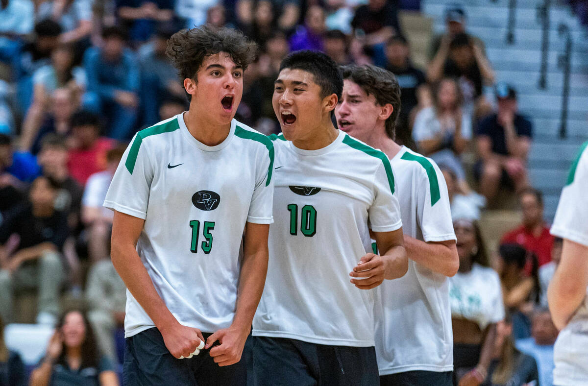Palo Verde's Davide Bruce (15) and Dylan Ho (10) celebrate another critical point against Coron ...