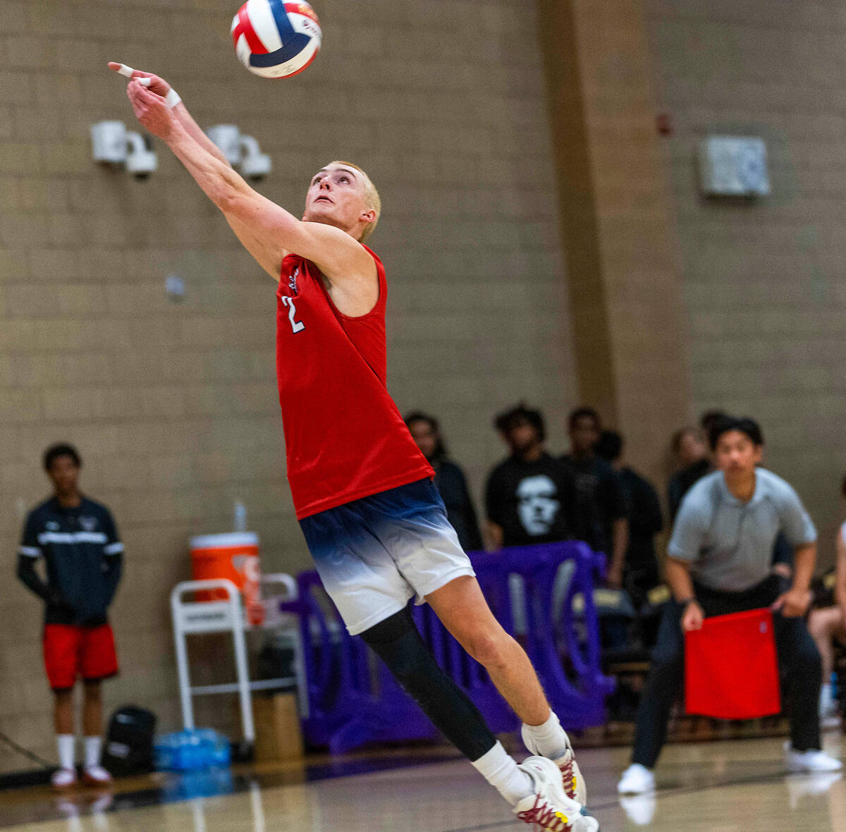 Coronado's Noah Price (2) tends to return a hit by Palo Verde during the Class 5A boy's volleyb ...