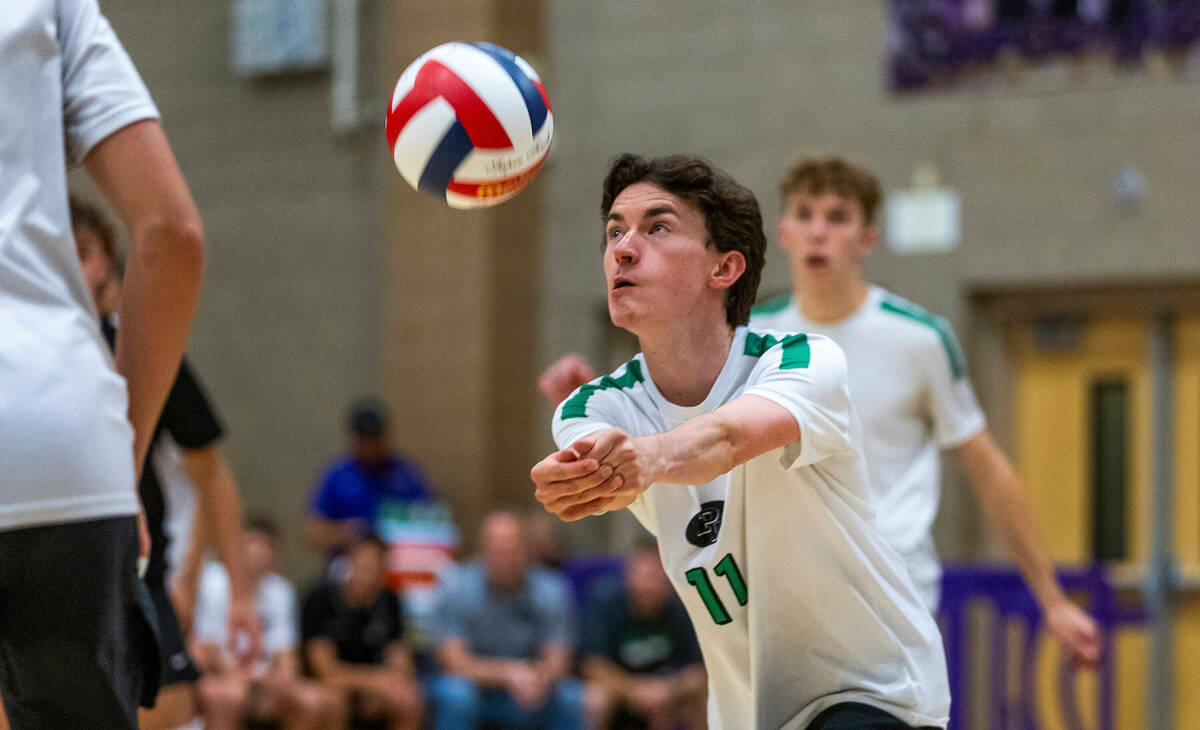 Palo Verde's Bridger McCoy (11) sets the ball against Coronado during the Class 5A boy's volley ...