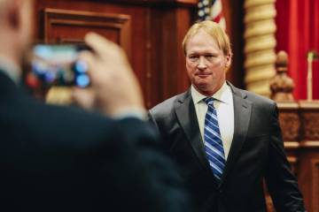 Former Raiders head coach Jon Gruden leaves court after appearing at a hearing for oral argumen ...