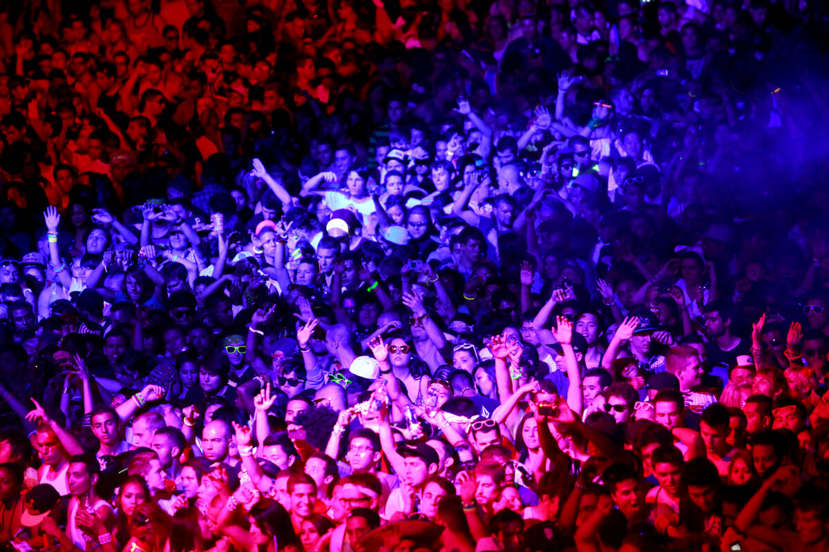 Ravegoers dance to Dirty South's set at the kineticFIELD during the Electric Daisy Carnival at ...