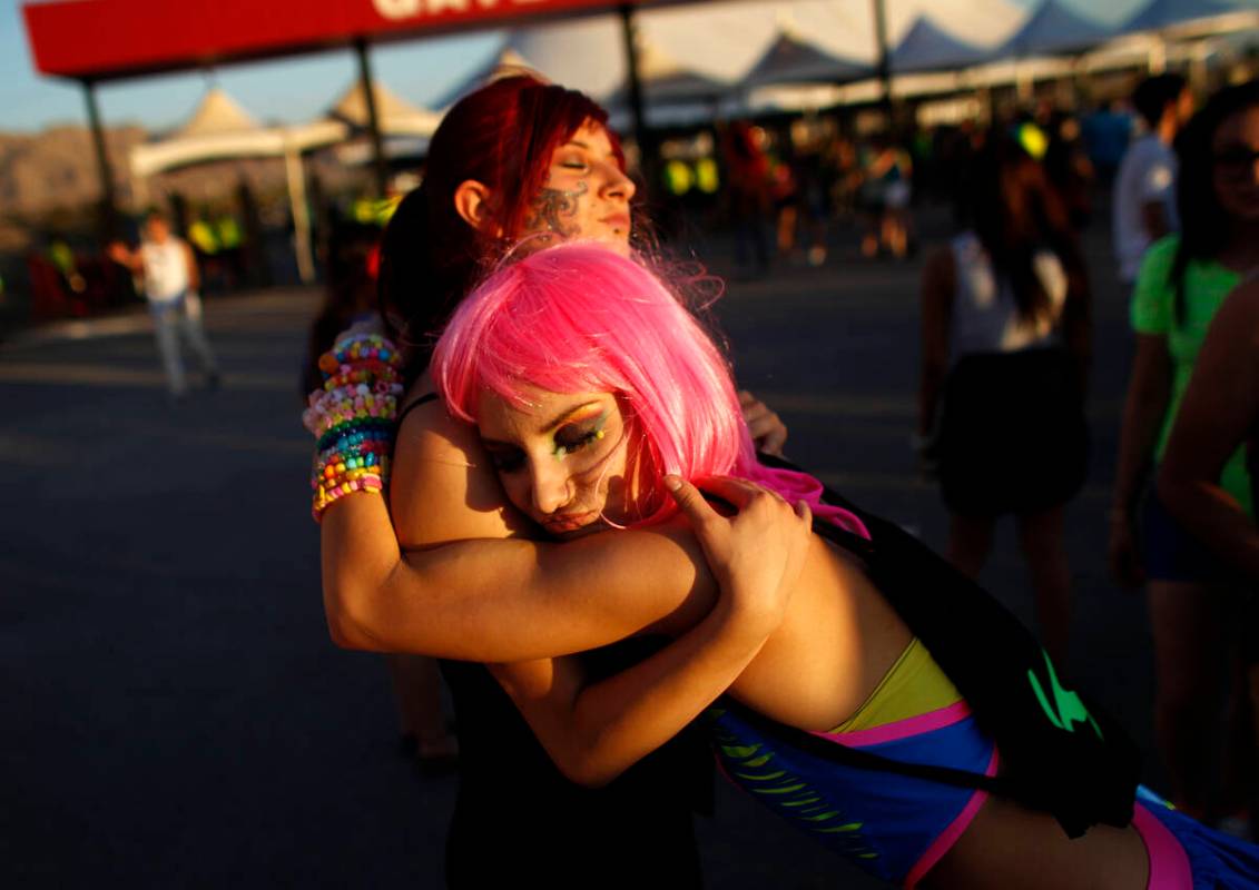 Justine Marsing, right, embraces Andrea Martinez at the Electric Daisy Carnival at the Las Vega ...