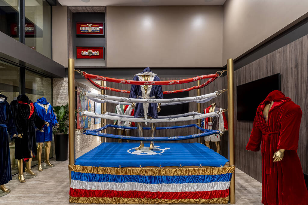 De La Hoya has a memorabilia room with boxing robes. (The Agency)