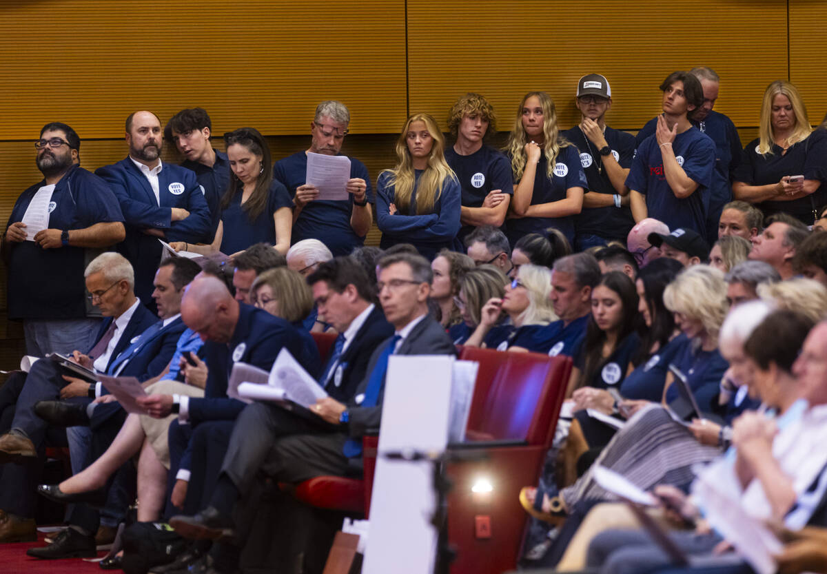 Supporters, in blue, of a proposed new Church of Jesus Christ of Latter-day Saints temple atten ...
