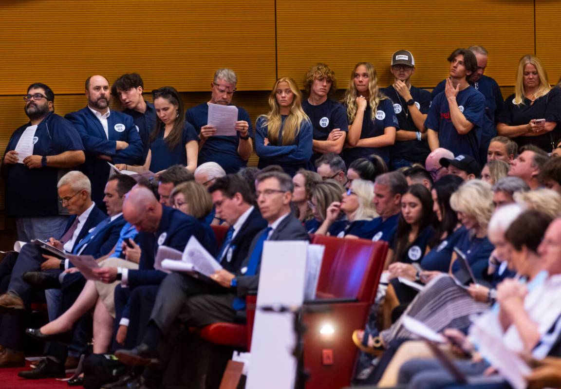 Supporters, in blue, of a proposed new Church of Jesus Christ of Latter-day Saints temple atten ...