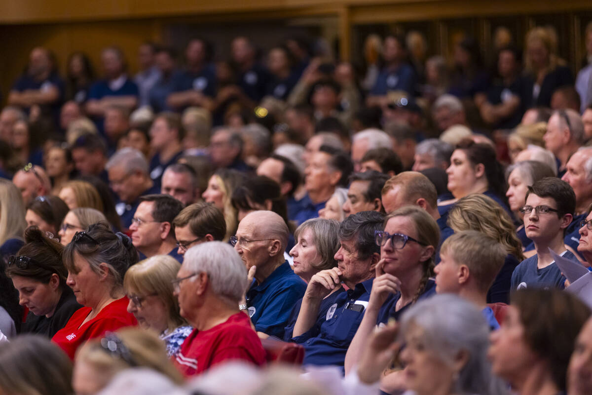 Supporters, in blue, of a proposed Church of Jesus Christ of Latter-day Saints temple attend a ...