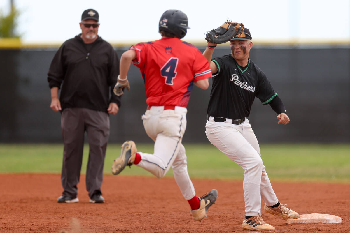 Palo Verde first baseman Tanner Johns gets an out on Coronado’s Jack Page (4) during a C ...