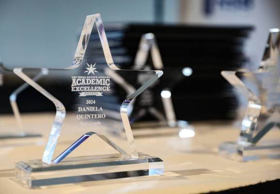 Trophies on display at the Las Vegas Review Journal’s Academic Excellence Awards ceremon ...