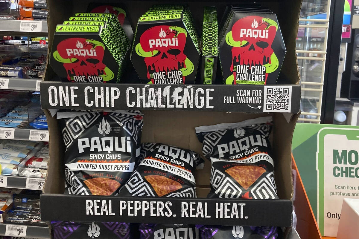Paqui One Chip Challenge chips are displayed at a 7-Eleven store in Boston, Thursday, Sept. 7, ...