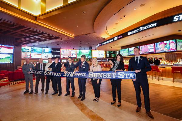 Casino executives and local officials cut a ribbon for the newly renovated STN Sportsbook at Su ...