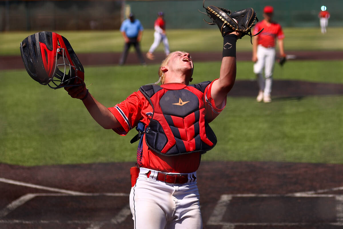 Coronado catcher AJ Stalteri (12) mitts a foul ball for an out on Reno during a Class 5A baseba ...