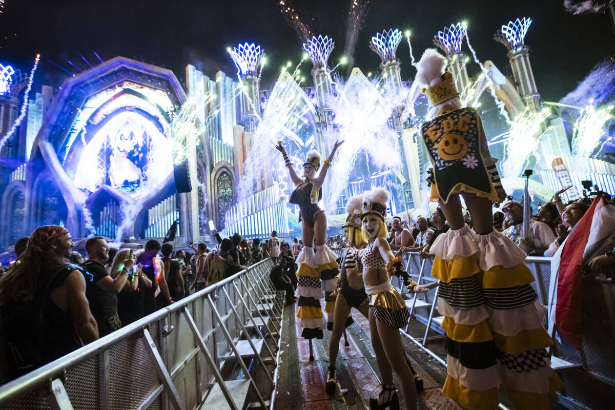 Costumed performers entertain the crowd at Kinetic Field during the second night of the Electri ...