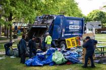 Crews disassemble the pro-Palestinian protest encampment in the quad at DePaul University's Lin ...