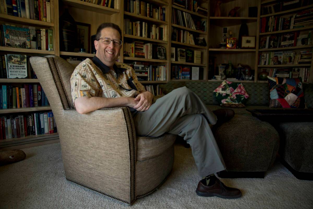 UNLV history professor Michael Green poses for a photograph inside his home near Tropicana Aven ...