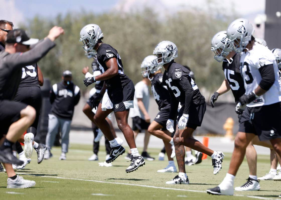 Raiders rookies, including cornerback Decamerion Richardson (25), warm up during rookies first ...