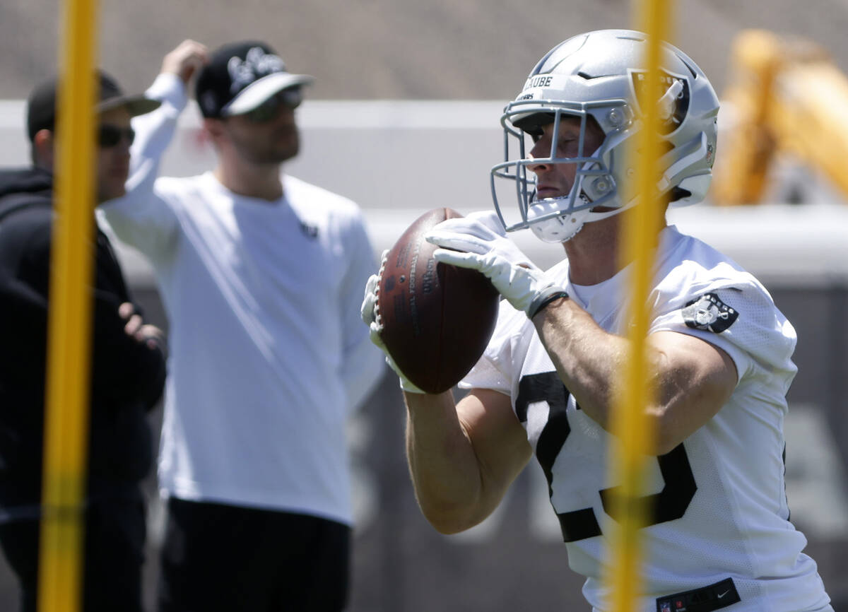 Raiders rookie running back Dylan Laube (23) catches the ball during rookies first day of pract ...