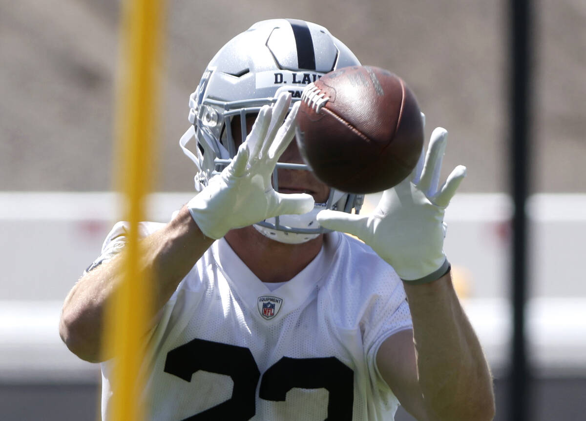 Raiders rookie running back Dylan Laube (23) catches the ball during rookies first day of pract ...