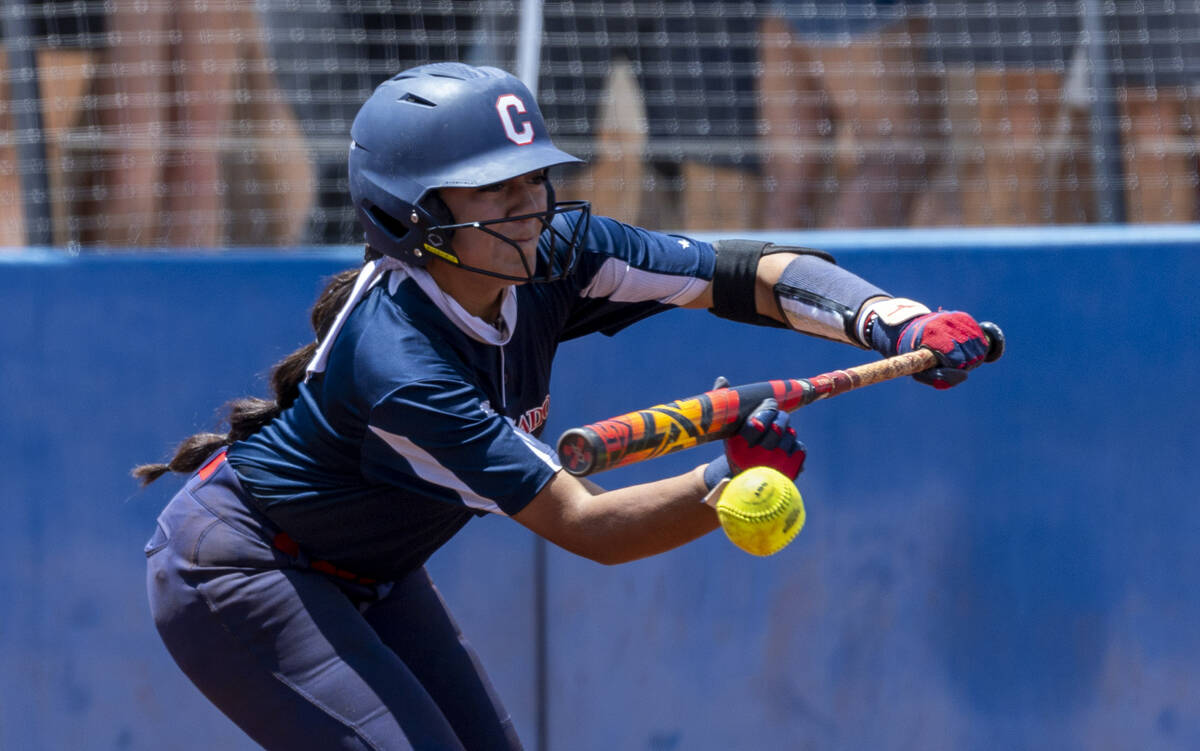 Coronado batter Sarah Lopez (5) bunts a Douglas pitch during the sixth inning of their 5A softb ...