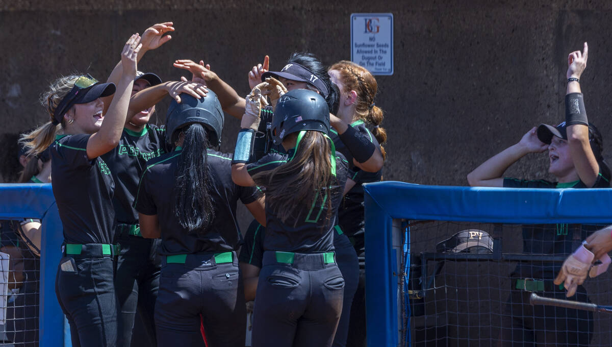 Palo Verde runner Kayleen Enriquez (6) is celebrated for scoring by teammates against Spanish S ...