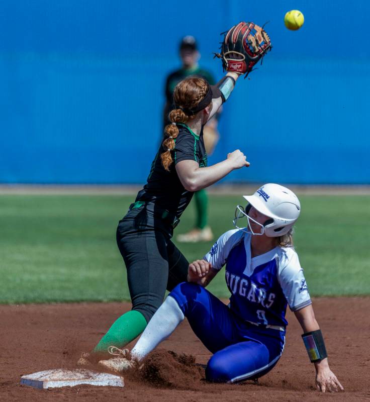 Spanish Springs runner Brooke Baxter (9) arrives at second base safely before a throw to Palo V ...