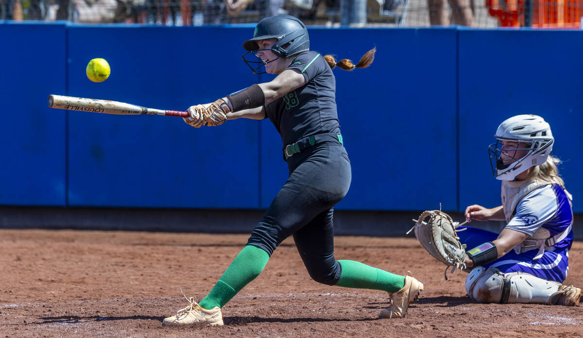 Palo Verde batter Mya Bartlett (18) connects on a Spanish Springs pitch during the fourth innin ...