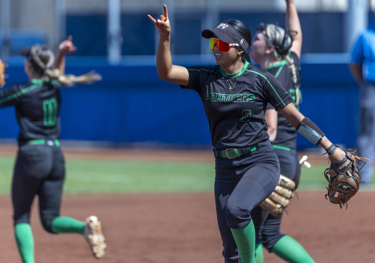 Palo Verde infielder Kayleen Enriquez (6) signals to her outfielder against Spanish Springs dur ...