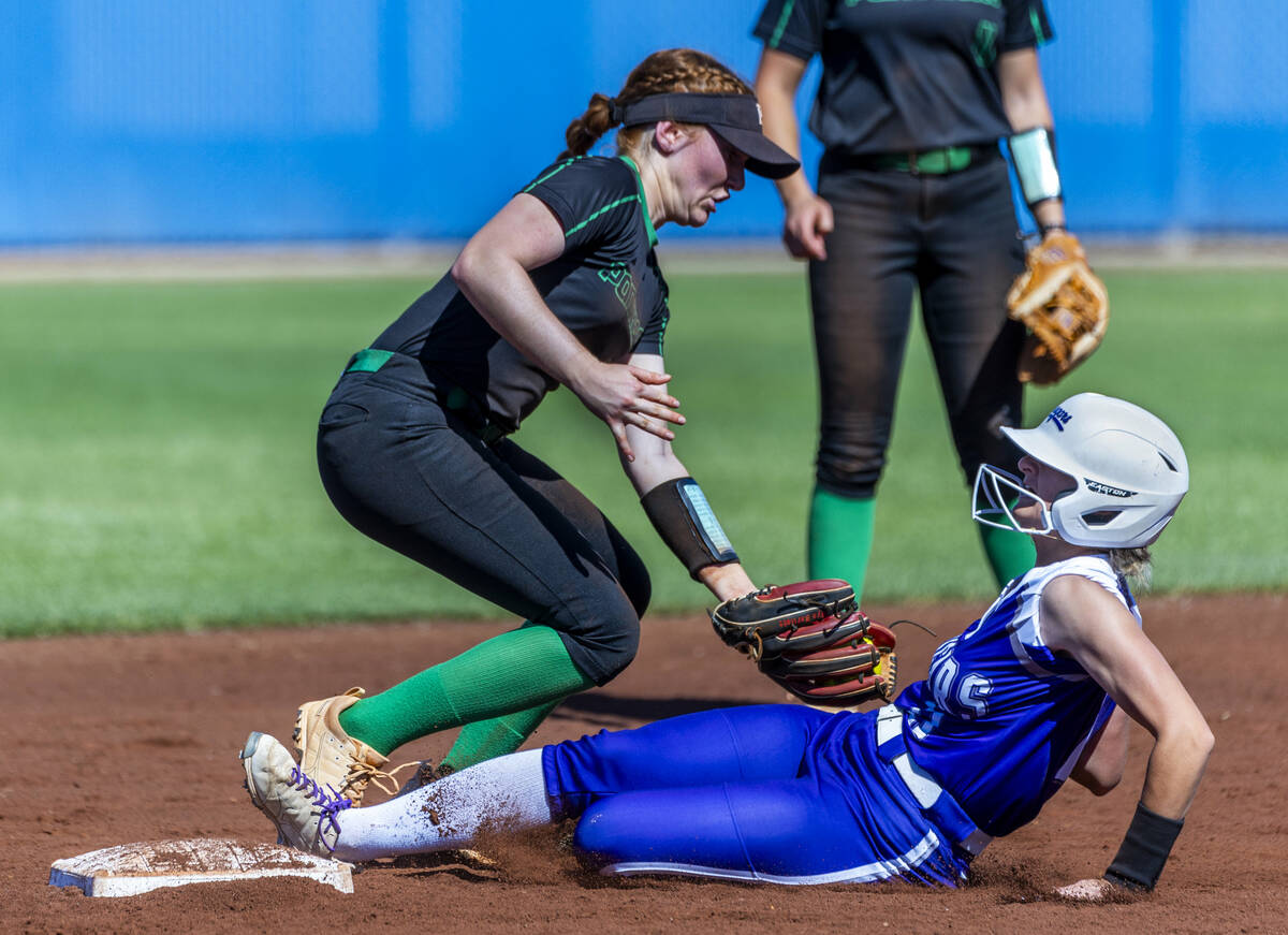 Palo Verde infielder Mya Bartlett (18) attempts a tag at second base as Spanish Springs runner ...