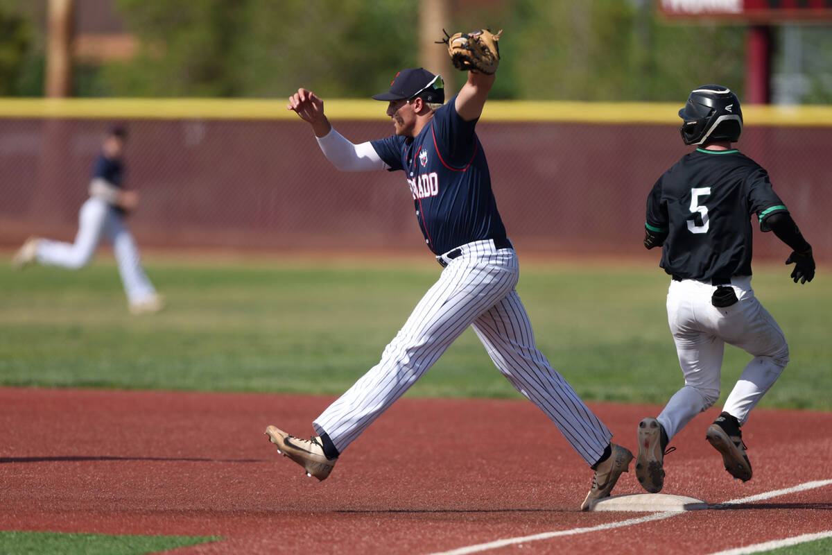 Coronado first baseman Brigham Bleazard (2) gets an out on Palo Verde catcher Connor Rosinski ( ...